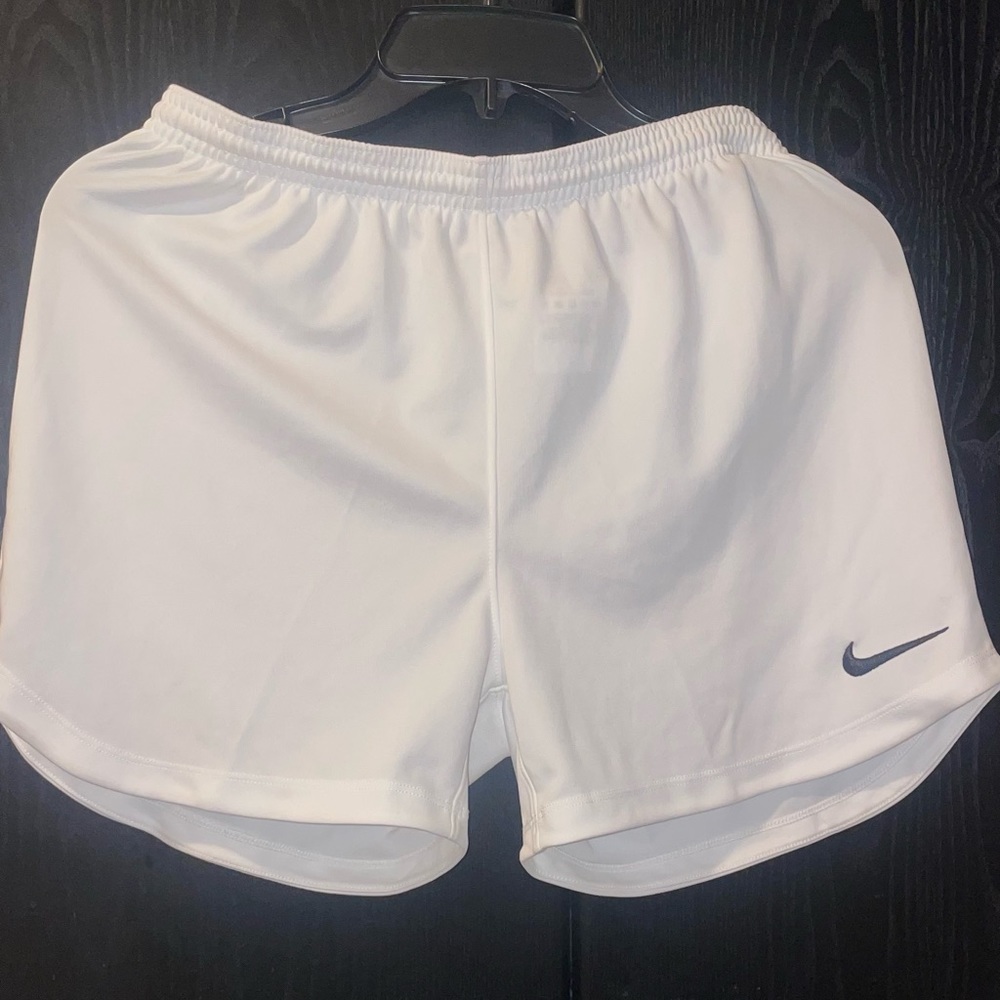 White Nike shorts